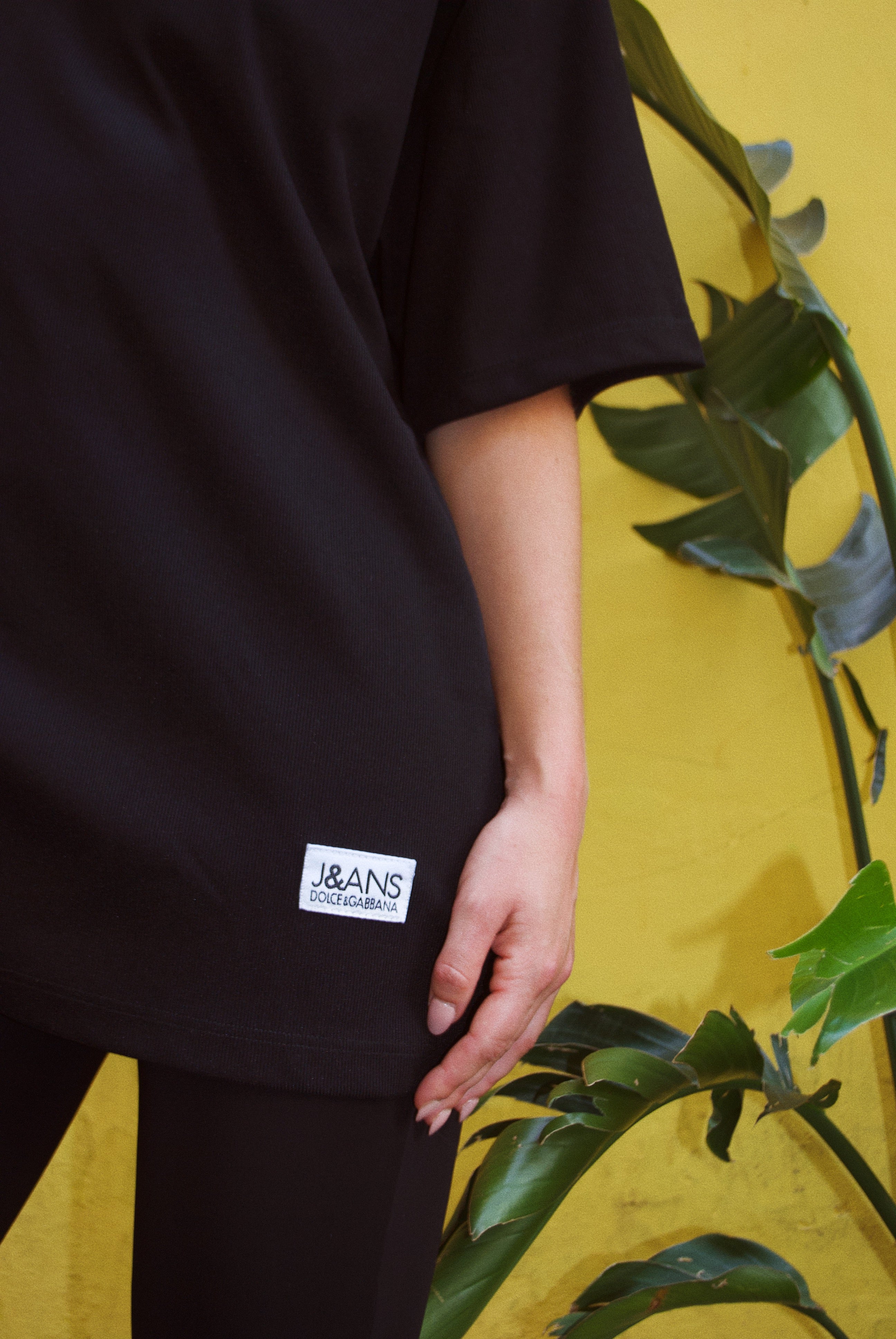 Polo noir zippé vintage Dolce & Gabbana J&ANS — Archive 90s